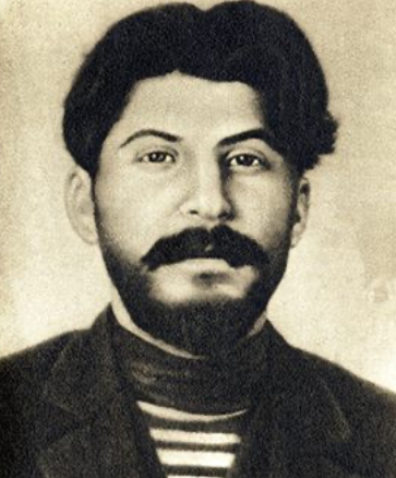 Stalin in a striped shirt and with a bosun's ribbon