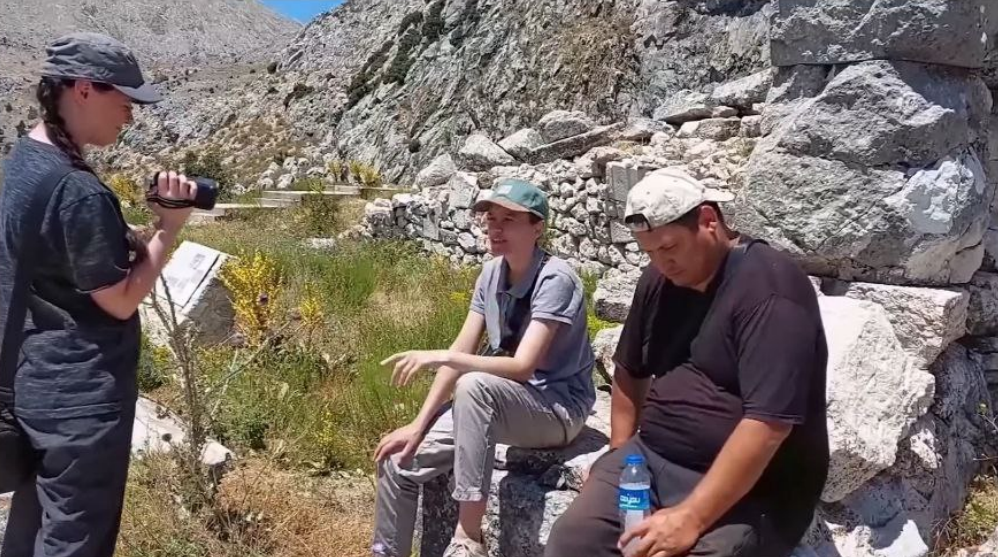 Readers of Aleksei Meniailov record interviews about their impressions of visiting the ancient city of Sagalassos. The recording is being made for an amateur video about a tourist trip to Turkey and a meeting with the writer Aleksei Meniailov