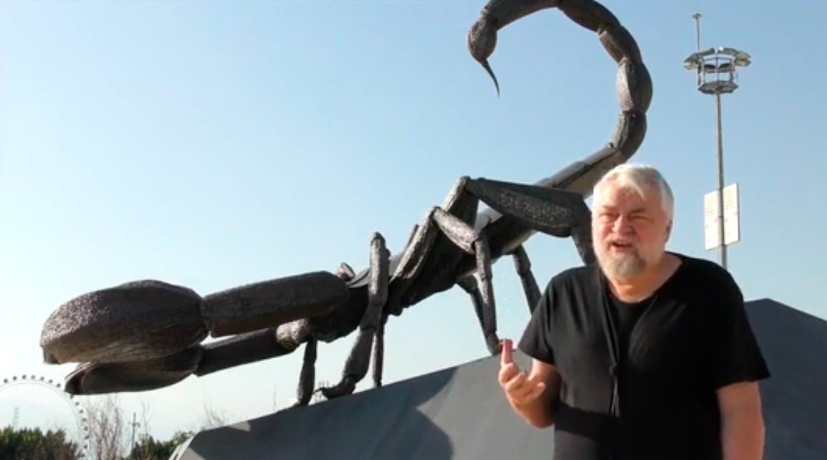 Aleksei Meniailov at the sculpture of the scorpion in Ankara