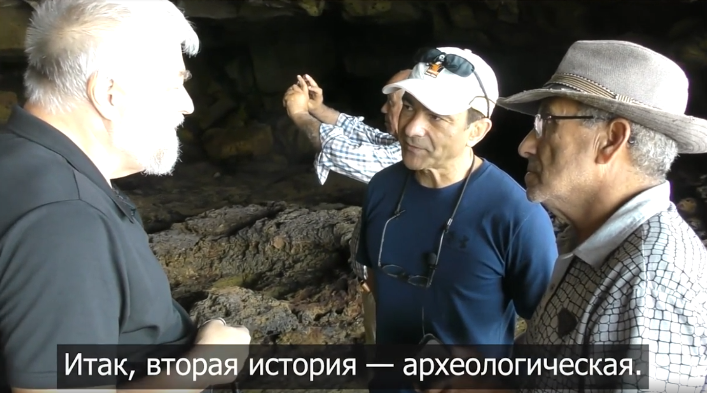 Writer Aleksei Meniailov talks with Swiss professor of anthropology Fouad Marsaoui during a joint tour to the caves of the Atlantic Ocean coast near the city of Safi. An image from the video "Conversation with a speleologist"