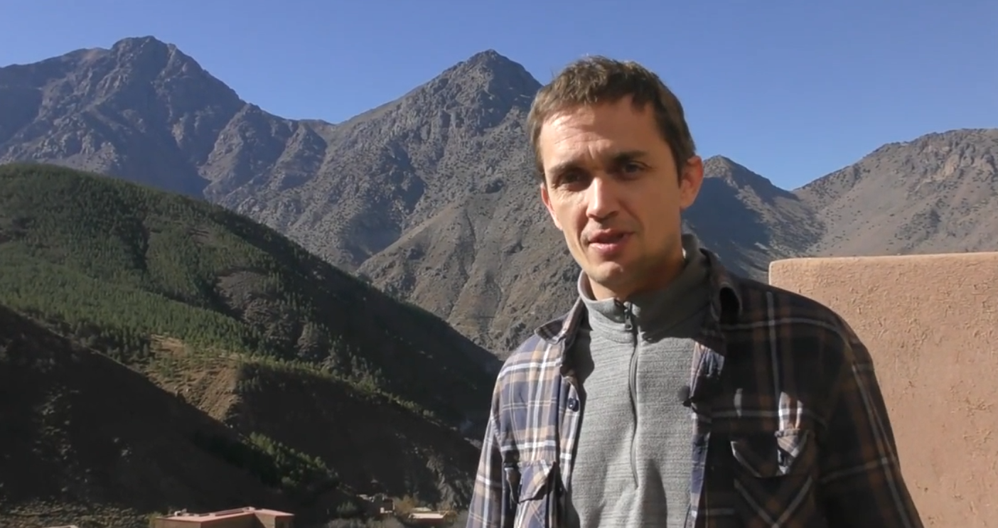 Aleksei Meniailov’s reader gives an interview during a joint tourist trip with the writer in the vicinity of Mount Toubkal. A frame from a video about Mount Toubkal