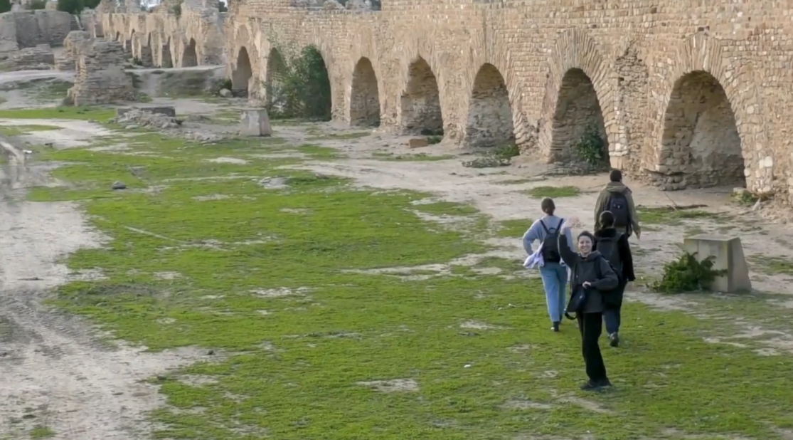 Slatana Meniailova and the readers of Aleksei Meniailov inspect the ancient aqueduct in the vicinity of Tunis